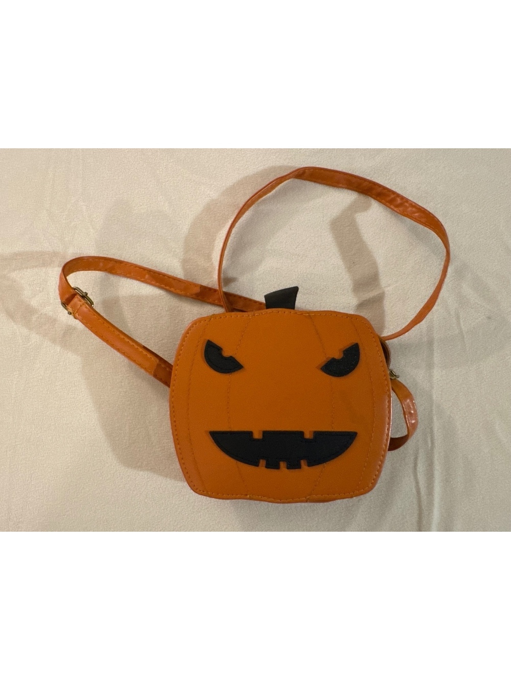 Orange pumpkin face crossbody bag